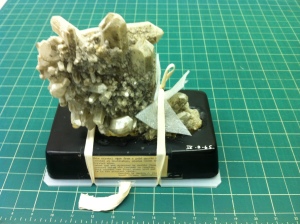Heavy mineral on resin base tied down to pallet...
