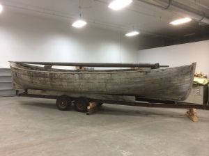 ASM 97-34-1Bristol Bay Double Ender, a fishing boat that will go on display, rigged with a new sail made by master sail maker Louie Bartos, and film footage will be projected on the replica sail.