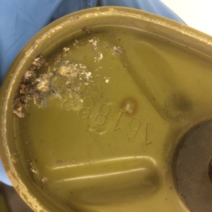 The canister of the gas mask has some corrosion.  This needs to be characterized and stabilized.