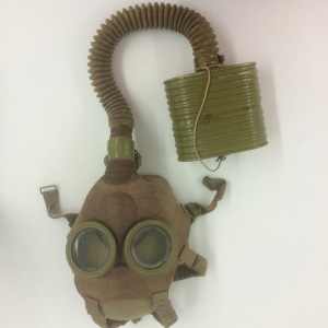 This gas mask, III-O-165, has a lot of rubber components that are still flexible, but who knows how long that flexibility will last?  Can we come up with a support system that will allow the item to be interpreted and studied in the future even when it gets stiff?